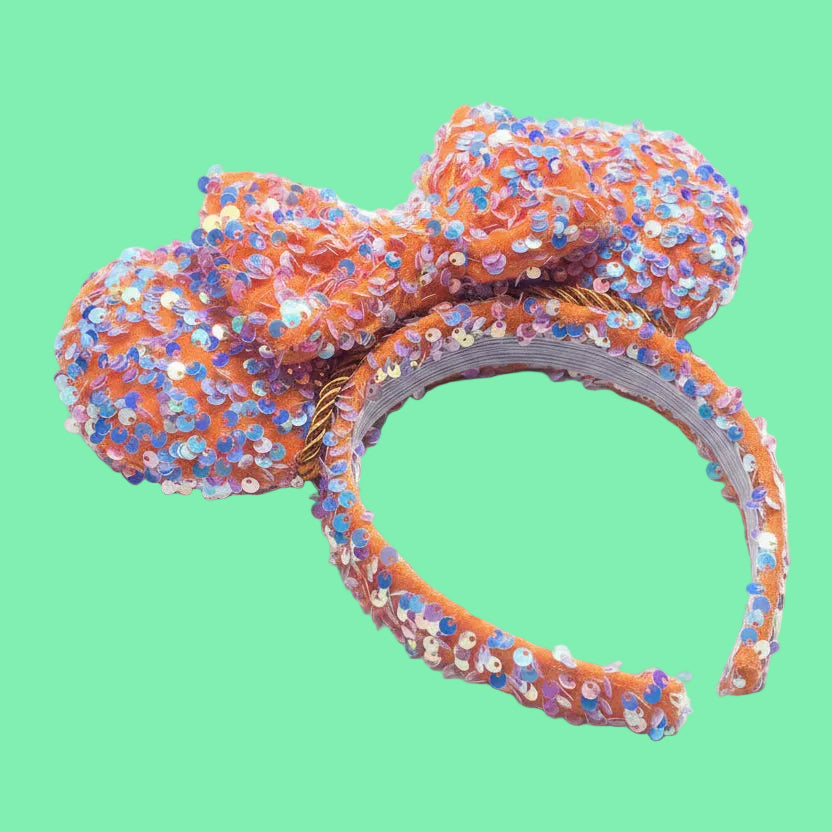 Handmade and ready to ship! Sequined bow headband has orange velvet soft fabric with mint sequin sparkles on it. The fabric is on the ears front and back, the bow and the headband as well. Orange twisted trim along the inner ears and set on a universal sized headband.