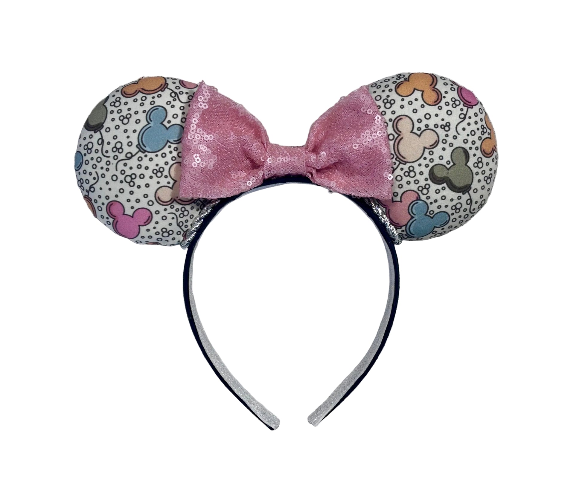 Handmade and ready to ship Mouse ears mouse balloons with a light pink sequin bow. Perfect for Main Street. Shown on a white background.