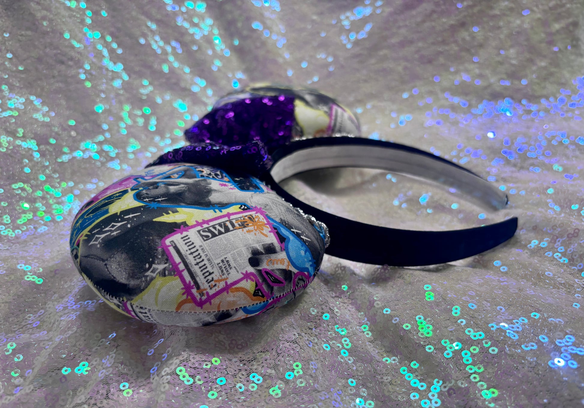 Handmade and ready to ship. Fabric images inspired by Tay and the fortnight video is on the front and back with a purple sequin bow. Shown on a white background.