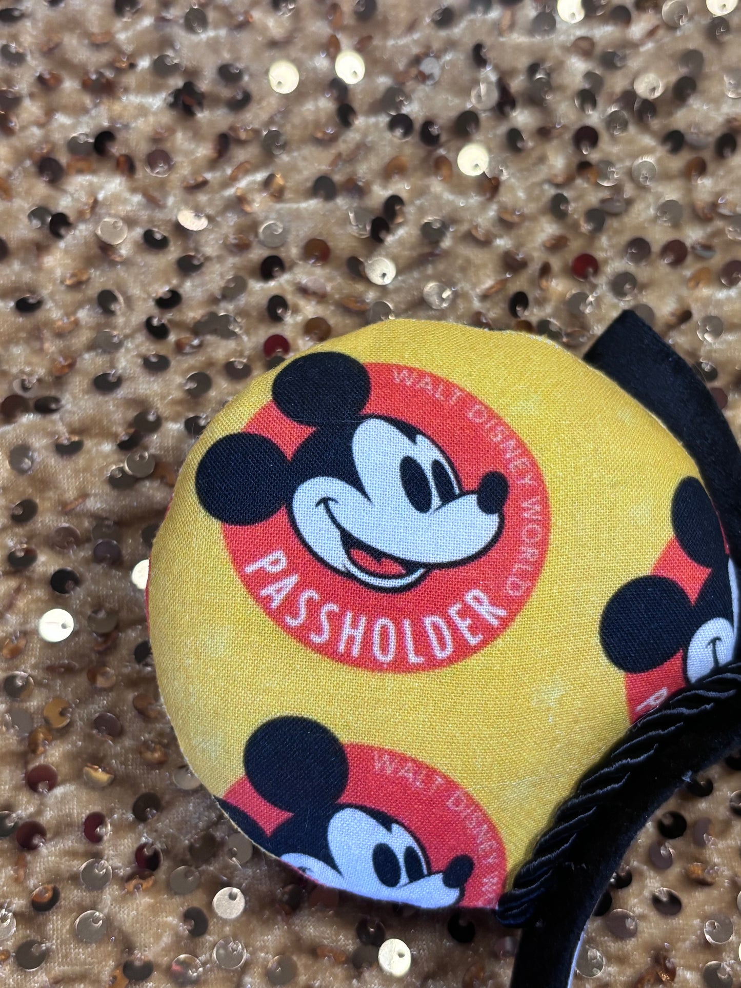 Close up of back side of left mouse ear on the headband.