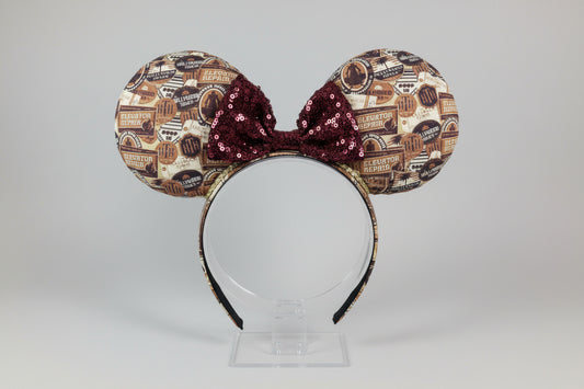 Tower of Terror inspired fabric on front, back and the headband as well. These are handmade and ready to ship mouse ears with a maroon sequin bow. 