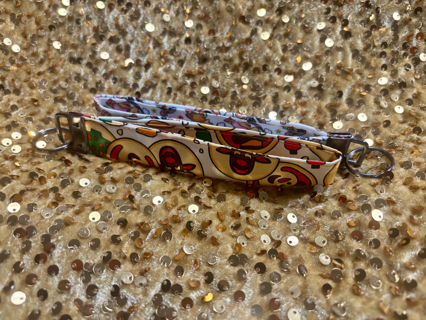 two Christmas keychain wristlets