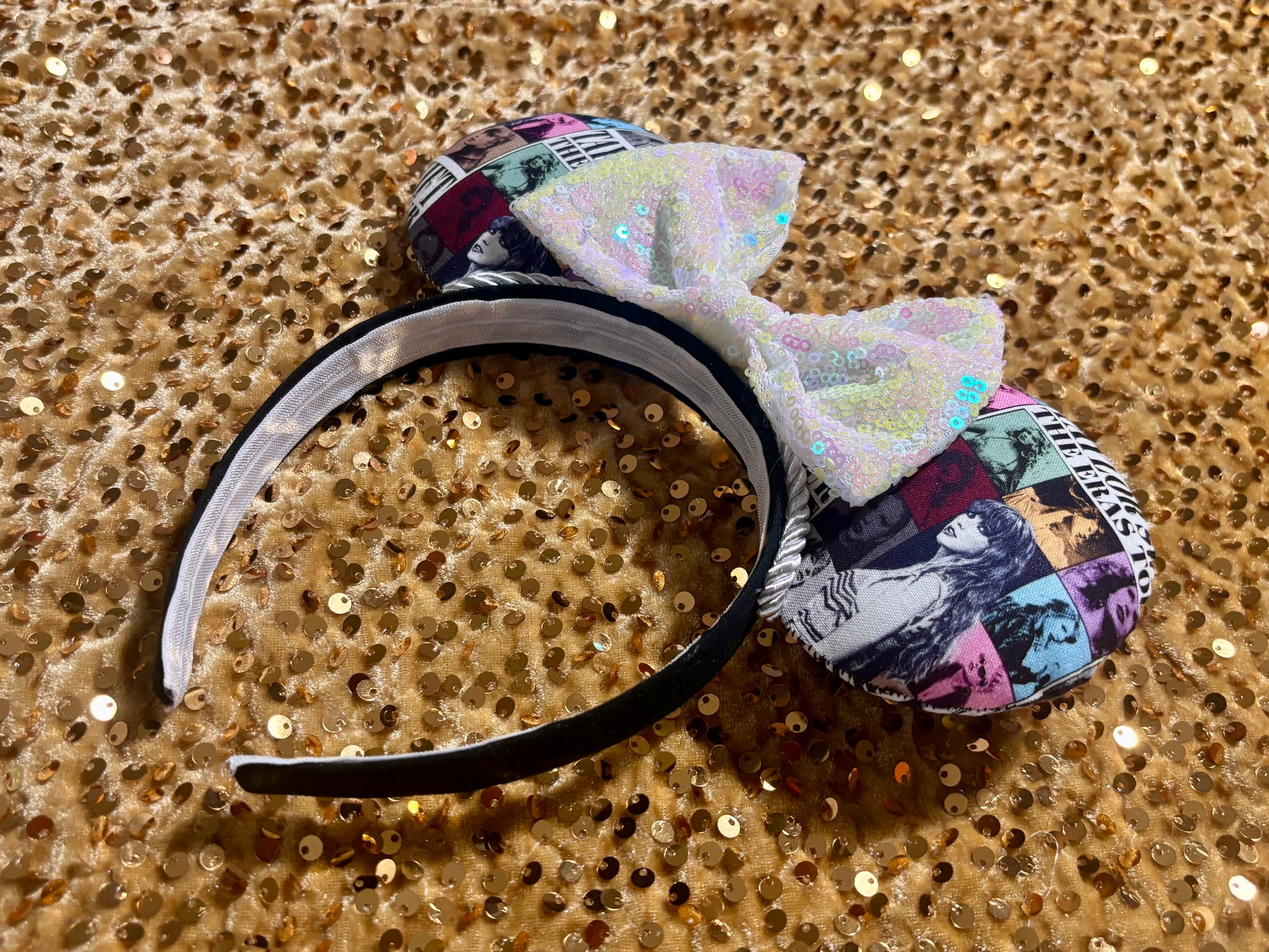 Handmade and ready to ship ERAS EARS with the fabric on both the front and back. On a black universal sized headband. The set has a WHITE IRIDECSENT sequin bow, but you can request any sequin color in your order and I'll attach it.