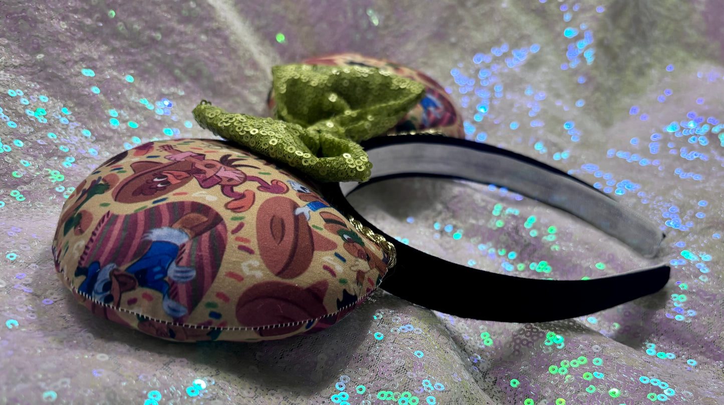 Handmade and ready to ship. These are perfect for Epcot. Three Caballero themed with a lime green sequin bow on a headband making mouse ears. Side view of headband and stitching shown.