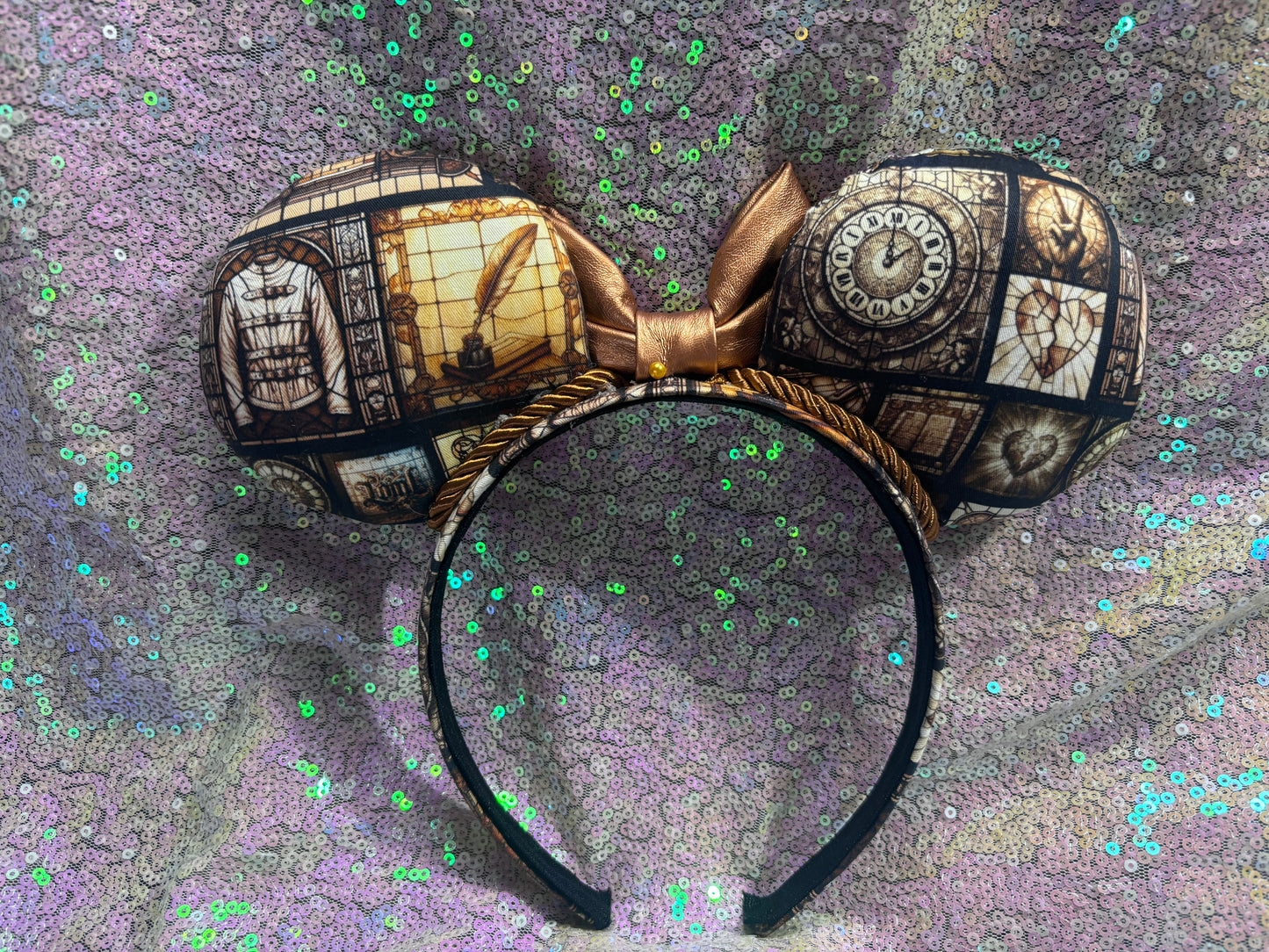 Decorative headband with intricate design on a textured surface