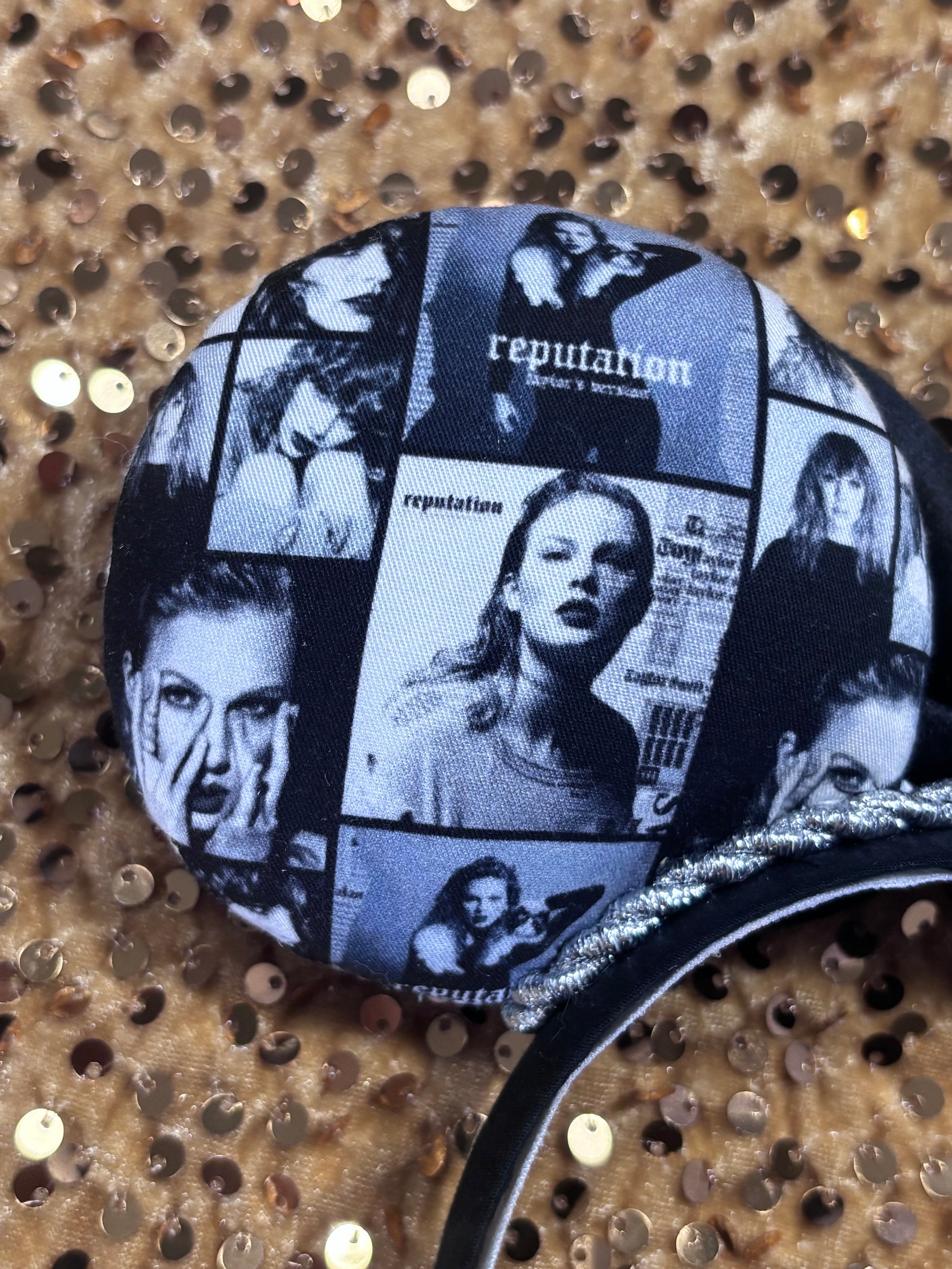 Back left view of Handmade and ready to ship "BAD' reputation Mouse ears with a new beautiful black velvet bow. Of course, you can still request any bow in sequin if you prefer and I will attach it. Shown on a gold sequin background.