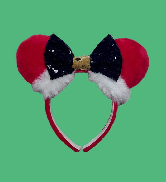 Handmade, and ready to ship. Santa Claus inspired Mouse ear headband with red plush soft fabric on the front and back of ears with a black sequin bow with a gold velvet sequin middle as f its Santa\s belt. Fluffy white trim along the inner ears. Mouse ears are on a Universal sized black cotton poly headband.