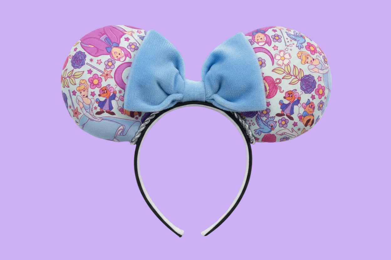 Cindy’s friend’s Mouse ears with a soft plush blue bow on a purple background. Handmade and ready to ship.