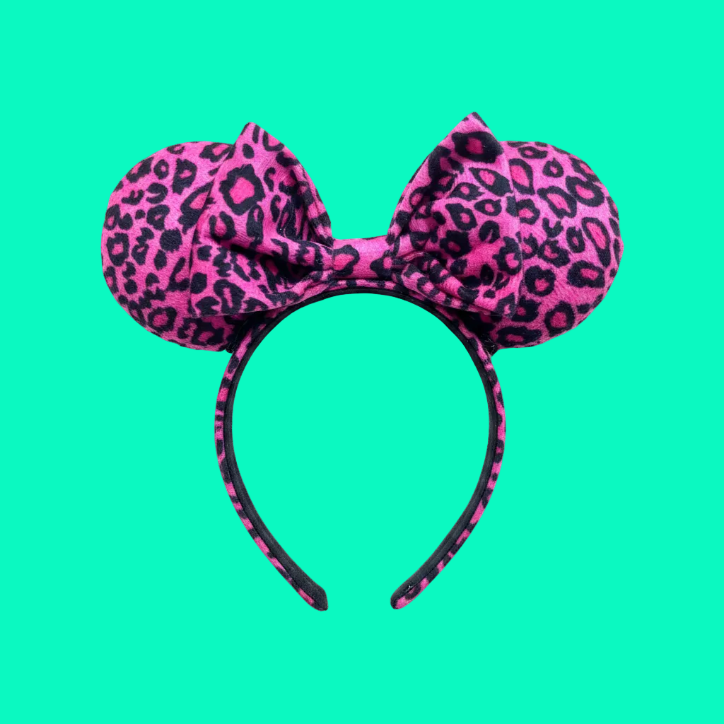 Handmade and ready to ship custom ears in a pink leopard print on the mouse ears front and back. the hairbow and also the headband that is universal sized.