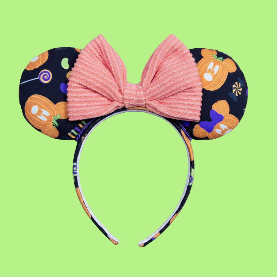 handmade mouse ears with Halloween boo to you fabric on ears and the headband.  Orange waffle print bow. Made and ready to ship.