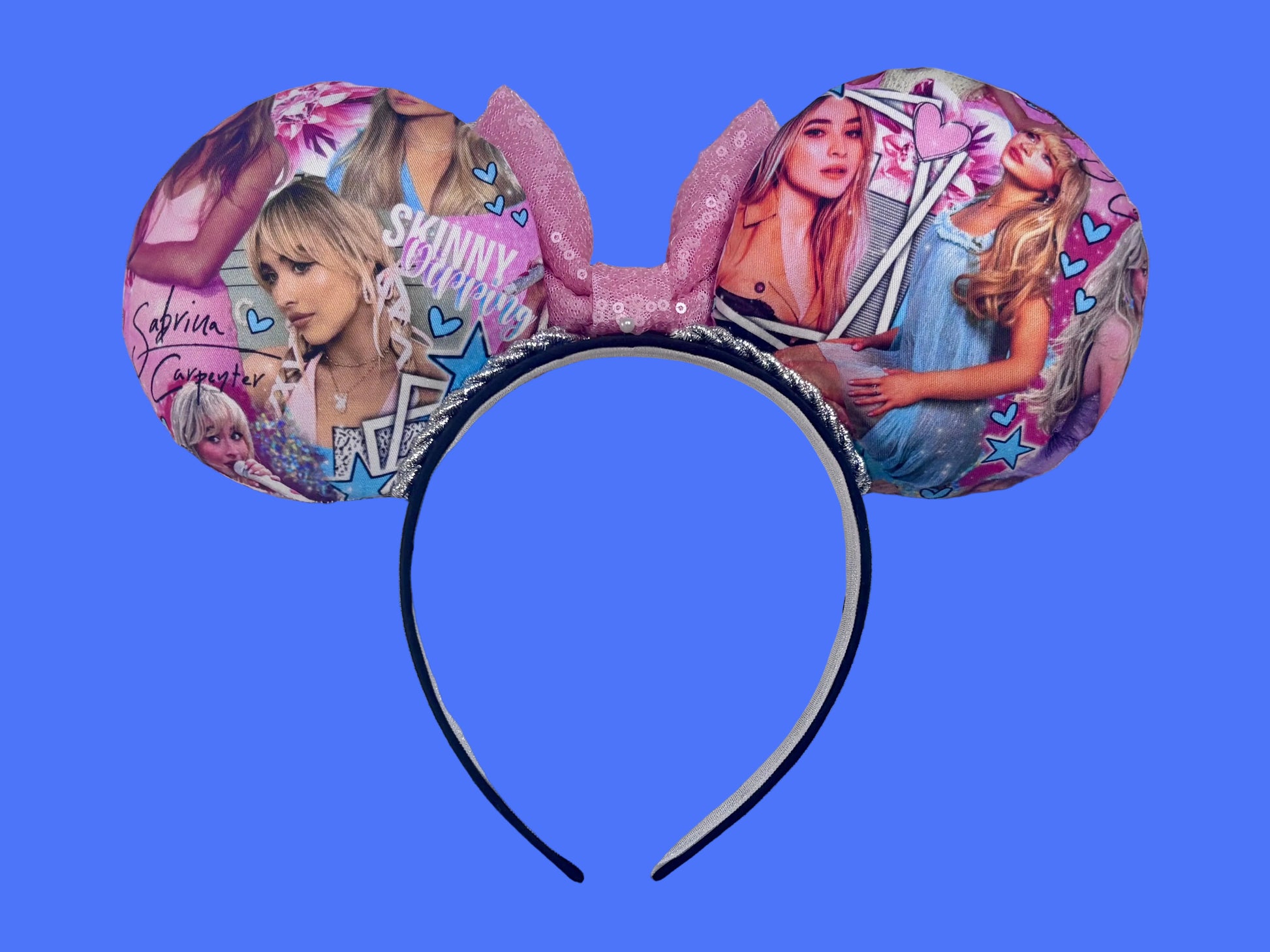 Back view of mouse ears. Handmade and ready to ship SC mouse ears with images of singer on the front and back of mouse ears with silver twisted trim and a light pink sequin bow on a black poly cotton headband.
