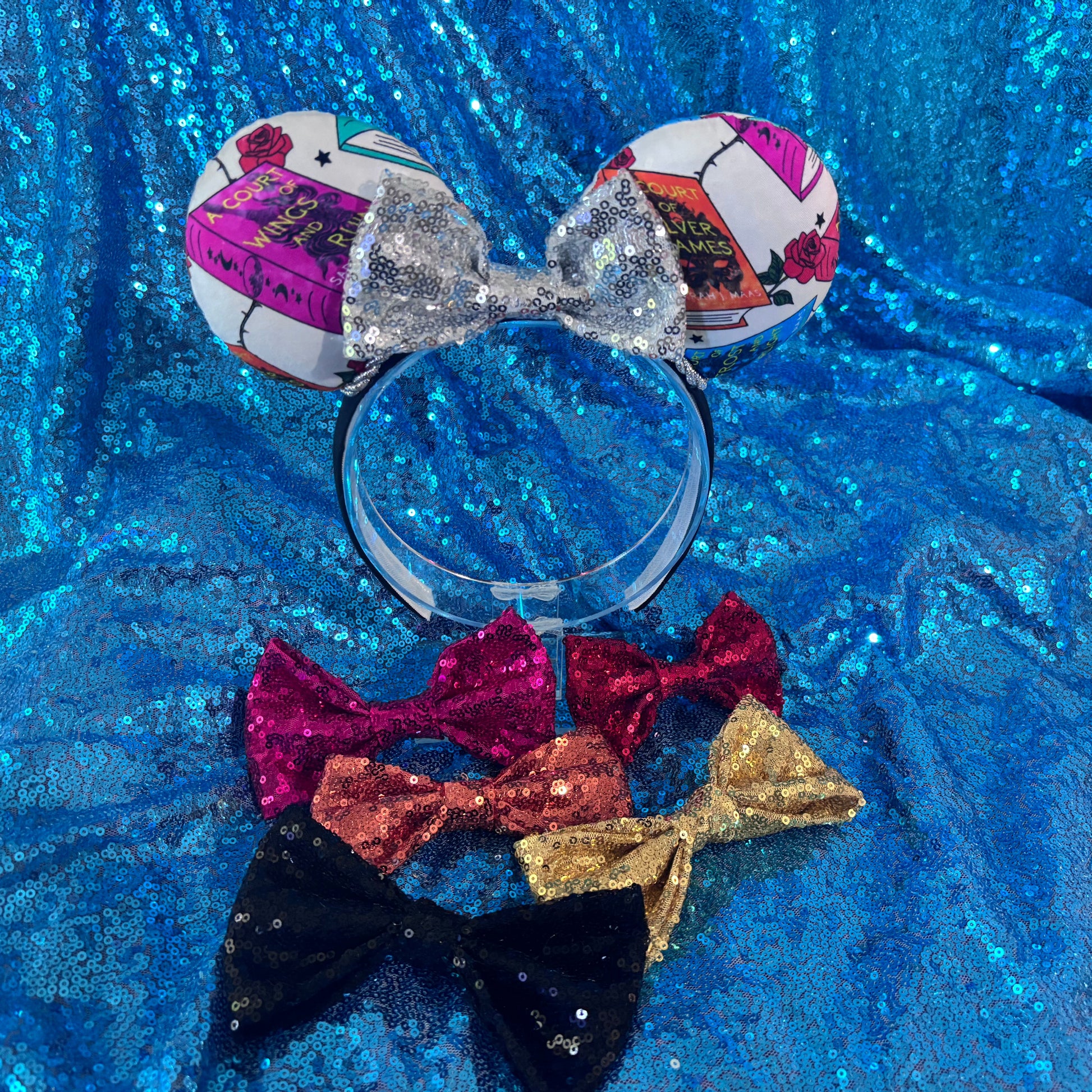 Set of colorful sequin bows on a blue glittery background. If you don't want the silver default bow, just write a note in your order and I will attach the bow color you want. 