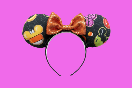 Handmade and ready to ship Halloween MNSSHP Mouse ears with the fabric on the ears, front and back and an orange sequin bow. The headband is a universal sized headband and has black poly cotton fabric on it.