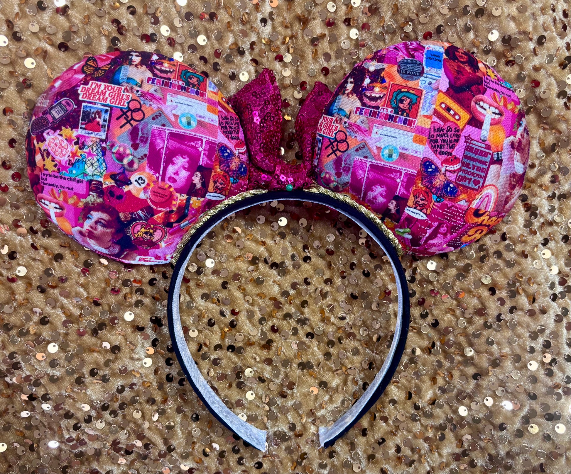 Handmade and ready to ship Colorful Chappell inspired Mouse ears with a hot pink bow on a headband against a gold sequin background.