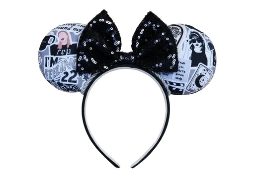 Handmade and ready to ship Mouse Ears with Black and White Swiftie sayings and pictures. has a black sequin bow.