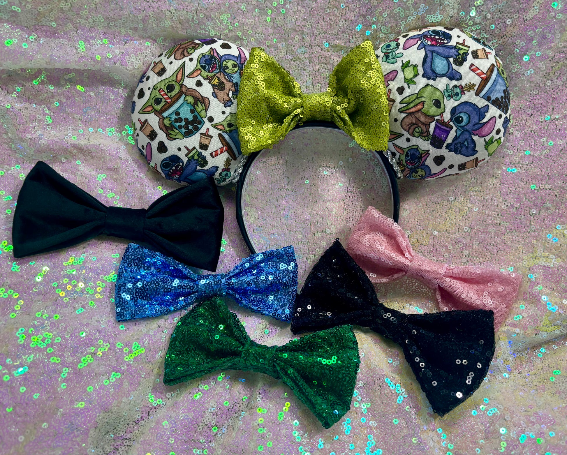 Handmade and ready to ship. Stitch and Baby Yoda are drinking coffee on the front and back with a lime green sequin bow. Shown on a white background with many bows to choose from if you don't want the lime green sequin.
