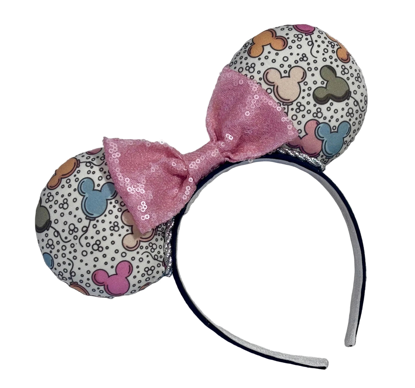 Handmade and ready to ship Mouse ears mouse balloons with a light pink sequin bow. Perfect for Main Street. Shown on a white background.