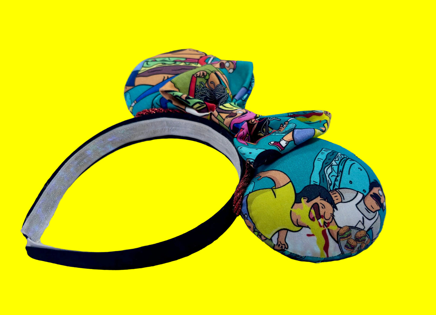 Side view of headband and ears. Handmade and ready to ship Burger Boss Mouse ears with the fabric on the ears, front and back and the bow. The headband is a universal sized headband and has black poly cotton fabric on it.