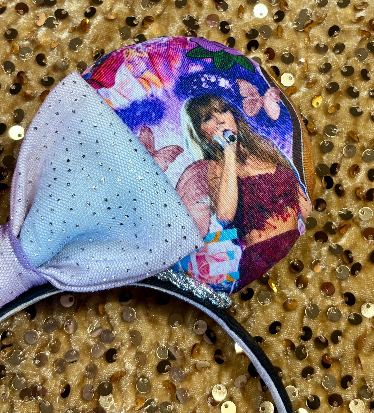 Other front side close up of details and images in design. Handmade and ready to ship TS Mouse ears with a new beautiful sewn tulle bow with sparkles on it. Of course, you can still request any bow in sequin if you prefer and I will attach it. Shown on a gold sequin background.