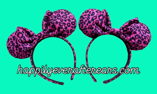Handmade pink leopard mouse ears. Made and ready to ship. Fabric is on the ears, headband and the bow as well. 