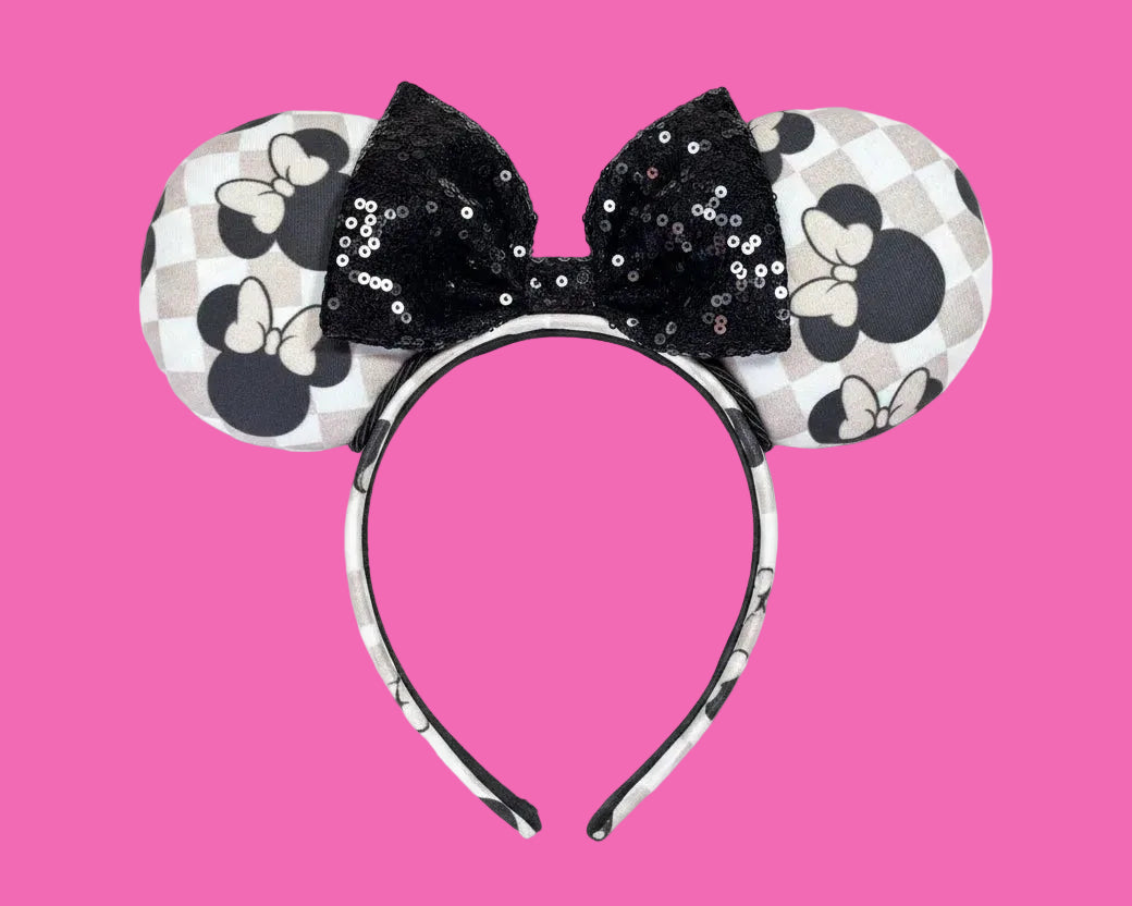 Handmade and ready to ship Checkered Mouse ears with famous Minnie ear bows on the design and a black sequin bow with black twisted trim on a universal sized headband.
