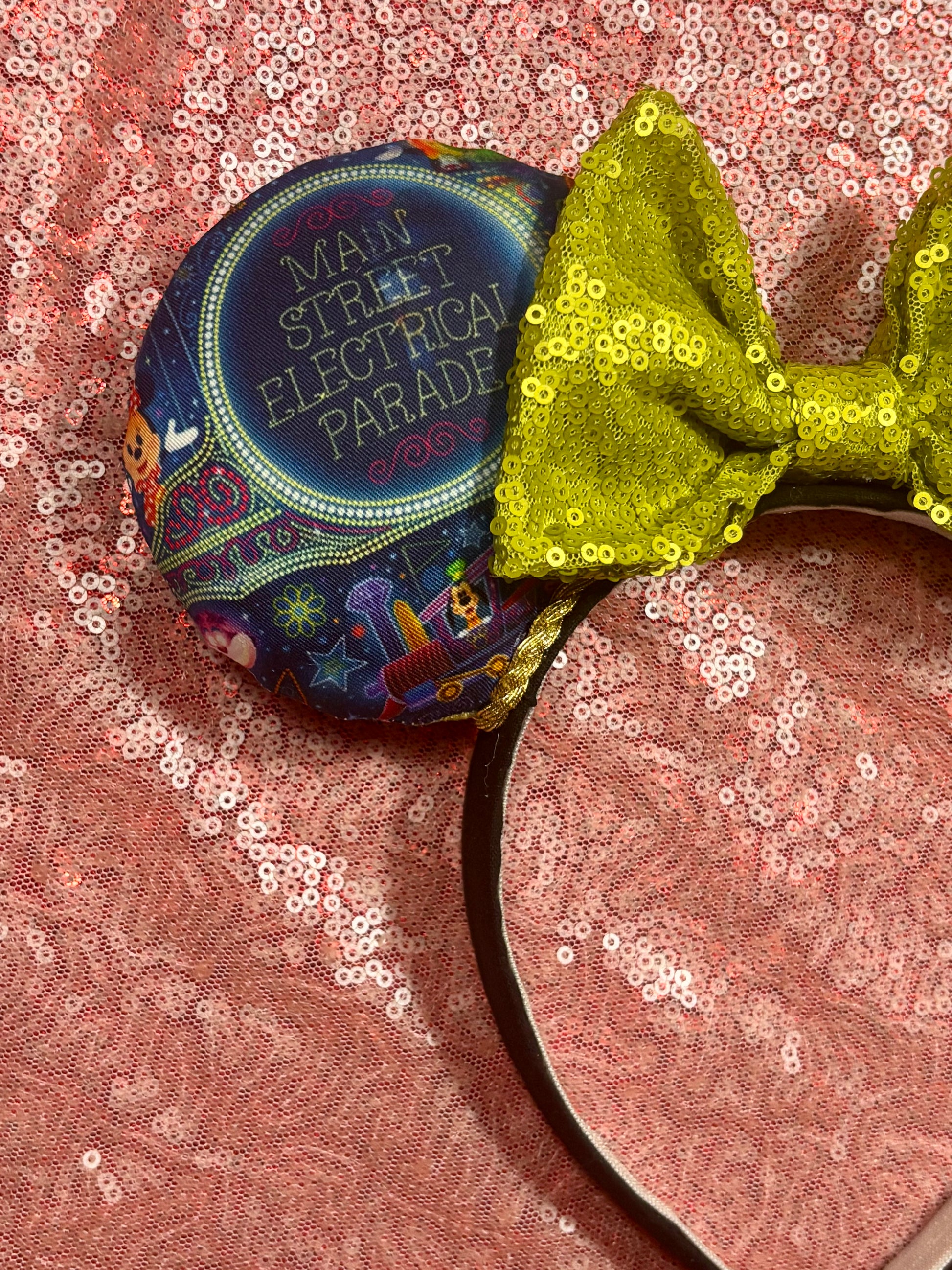 Handmade and ready to ship mouse ears. Mouse ears are on a universal sized poly cotton headband and set comes with a lime green sequin bow. Other colors are available if you leave a note.