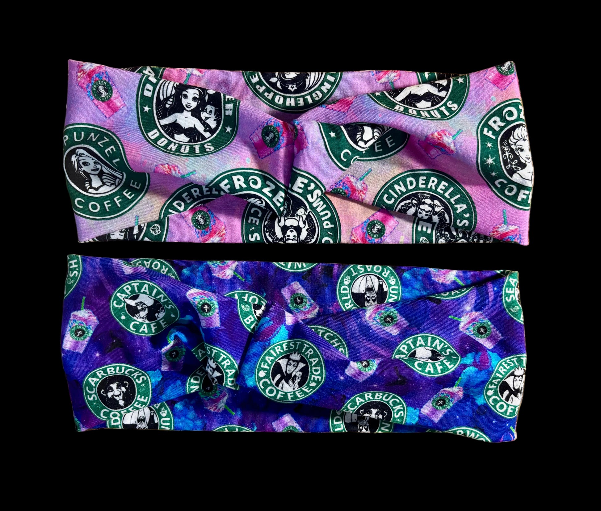 Two fabric twisted wrap headbands with coffee-themed designs one with villains and one with princesses. Shown on a glittery gold background.