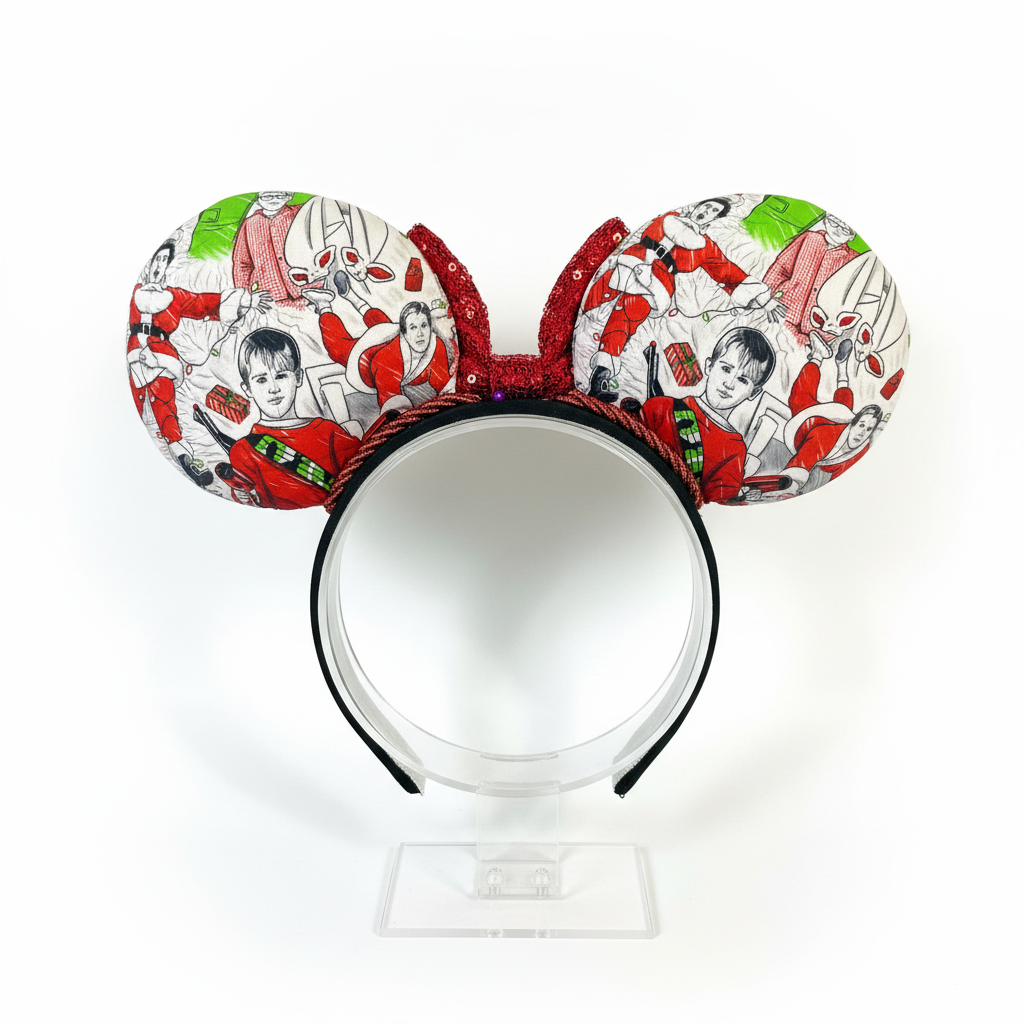 Classic Christmas films inspired fabric on front, back and the headband as well. These are handmade and ready to ship mouse ears with a red sequin bow. Shown on a white background. Back view of mouse ears.
