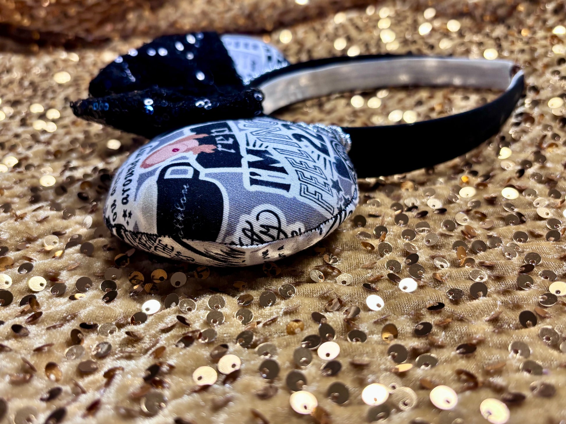 handmade and ready to ship Decorative headband with patterned design on a glittery surface