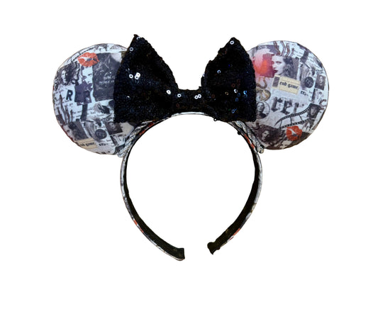 Handmade and ready to ship. These are Reputation Collage themed with a black sequin bow on a headband making mouse ears. Shown on a white background.