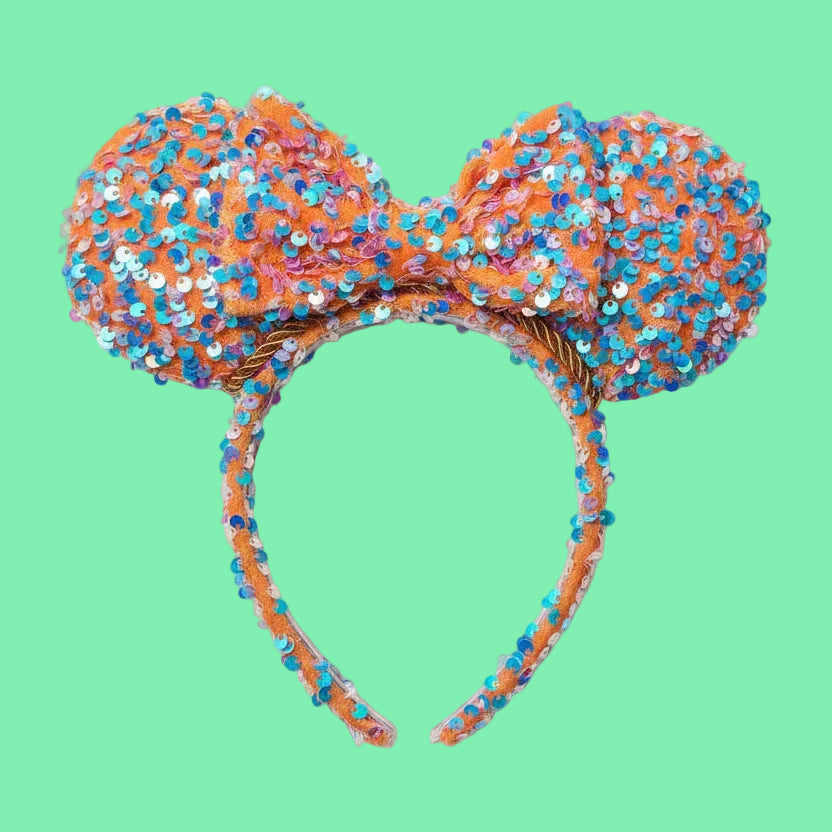 Handmade and ready to ship! Sequined bow headband has orange velvet soft fabric with mint sequin sparkles on it. The fabric is on the ears front and back, the bow and the headband as well. Orange twisted trim along the inner ears and set on a universal sized headband.