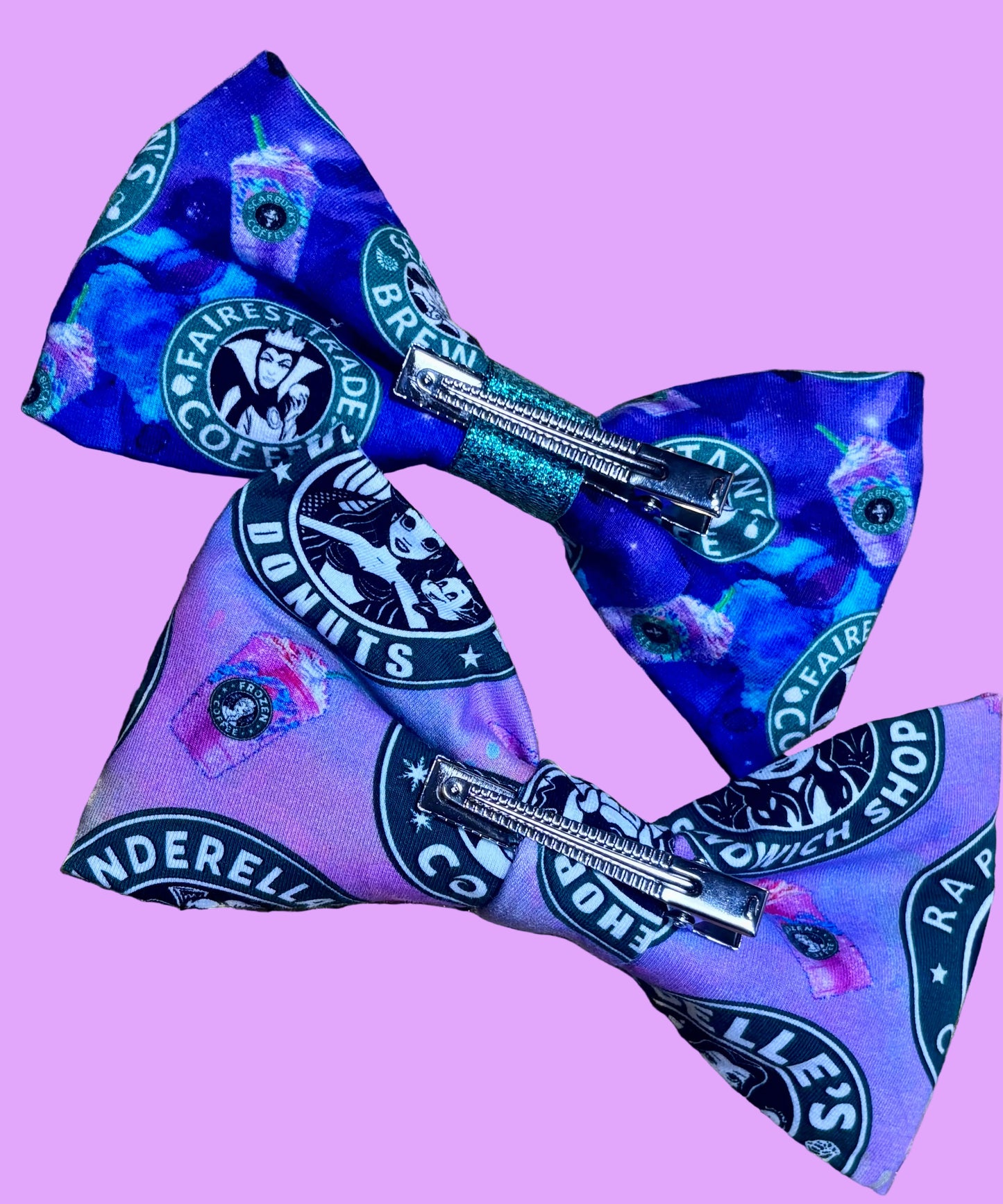 Handmade and ready to ship hairbows in a famous beloved coffee company's image but with princesses on one bow and villains on the other.  Back side showing the alligator clip backings.