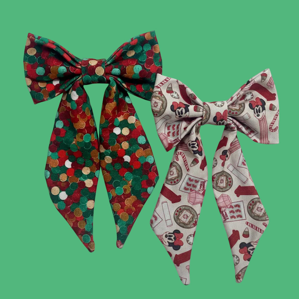 Two handmade and ready to ship French Tailed bows with barrette backings. Comes in Christmas color dots and Stocking Stuffers. Made with Cotton Lycra fabric. 