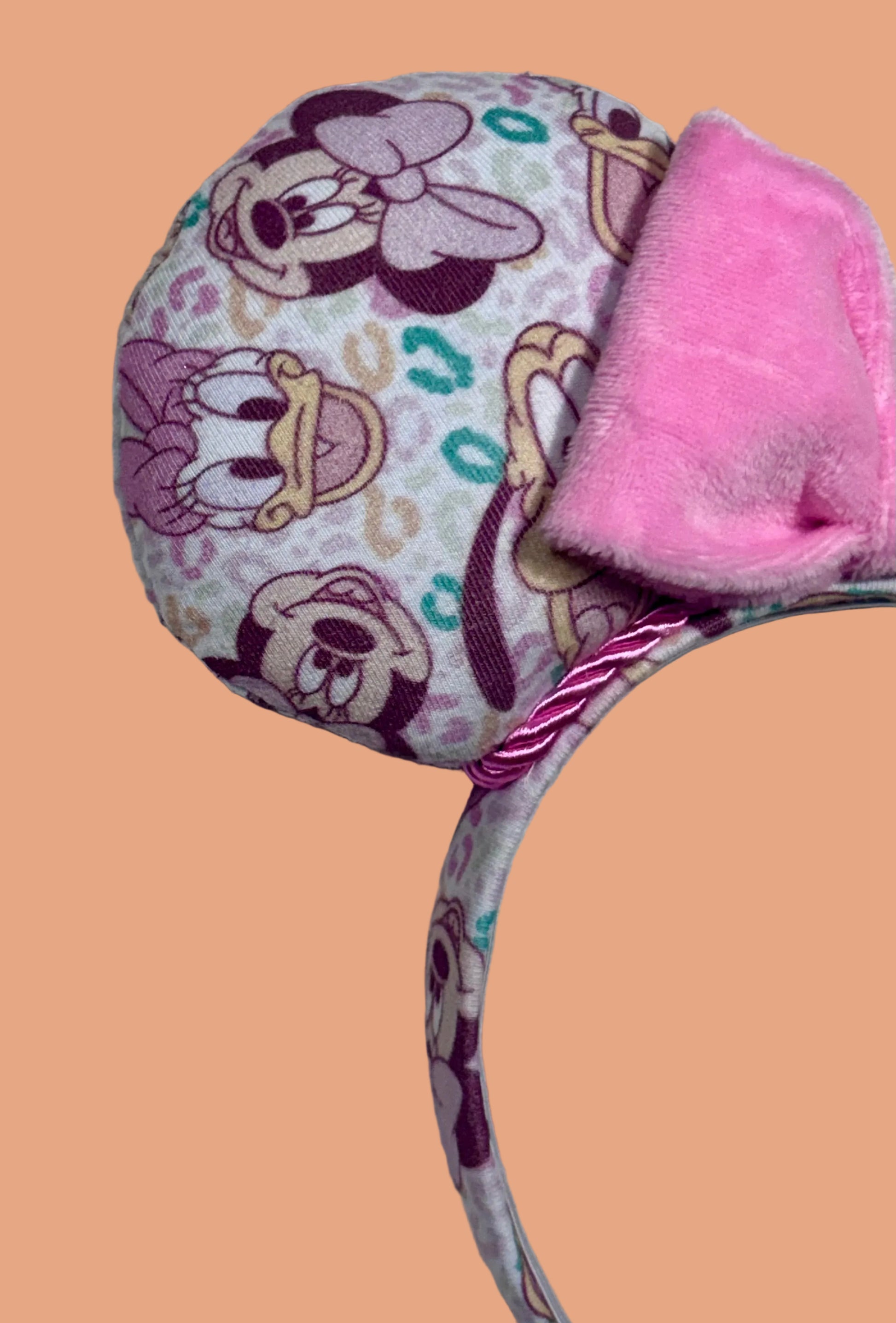 Pink and Leopard print with the fab 5 Mouse ears headband. Handmade and ready to ship Mouse ears with famous Characters on the design and a pink soft bow with pink twisted trim on a universal sized headband.