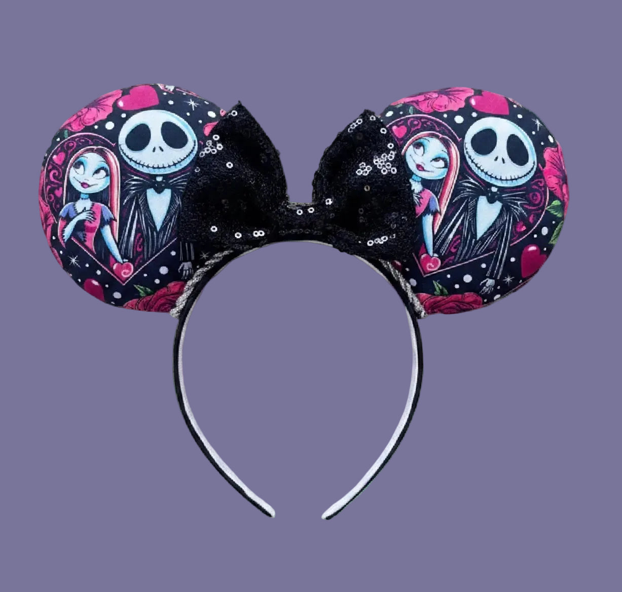Handmade and ready to ship. NBC themed mouse ears with fabric on both sides of the ears on a black headband with silver twisted trim and a black sequin bow.