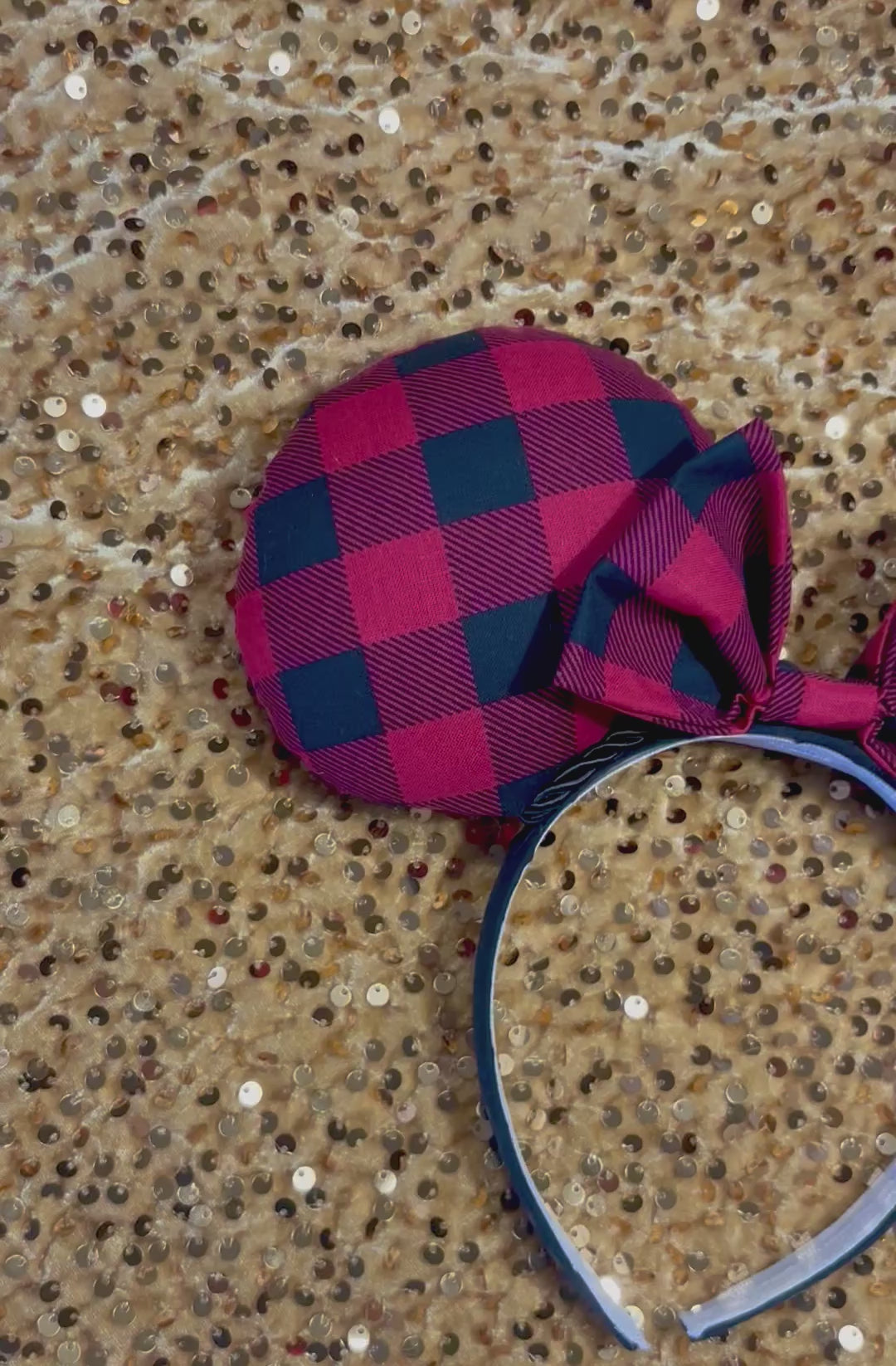 Handmade and ready to ship Buffalo Plaid mouse ears on both the front and back. On a black headband that is universal sized. The set shows a matching buffalo plaid bow. Item is shown on a gold sequin background.