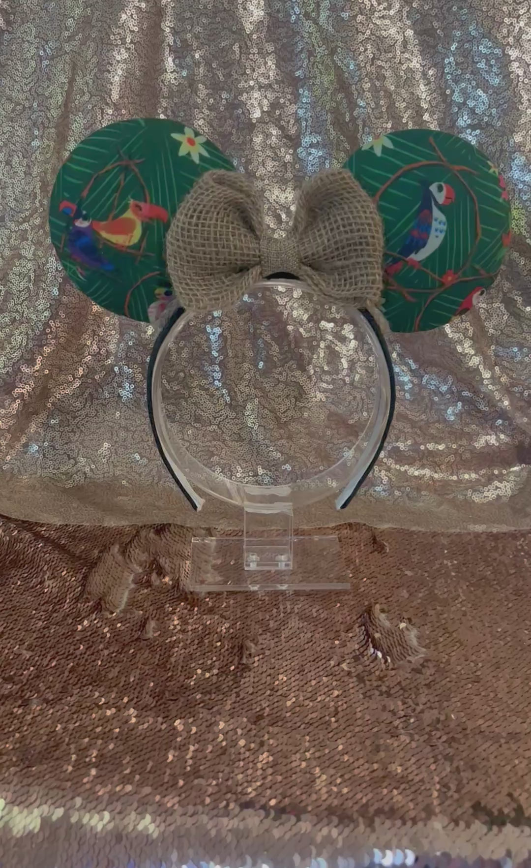 Handmade, made and ready to ship. TIKI inspired Mouse ear headband with Tiki bird on the front and back of ears with burlap bow and jute trim along the inner ears. Mouse ears are on a Universal sized black cotton poly headband.