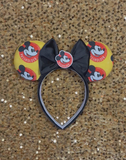 Handmade and ready to ship AP mouse ear headband. The fabric is poly cotton and has the AP logo all over the fabric front and back on a black poly cotton headband with a black velvet bow that has an AP flatback on the middle. 