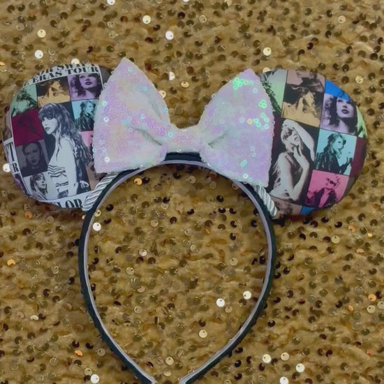 Eras Mashup Mouse Ear headband with white iridescent sequin bow. You can request any color sequin bow in your order by leaving a note. Handmade and ready to ship with fabric on both the front and the back of mouse ears. The set has a silver twisted trim along the inner ears. Ears are on a black poly cotton universal sized headband.