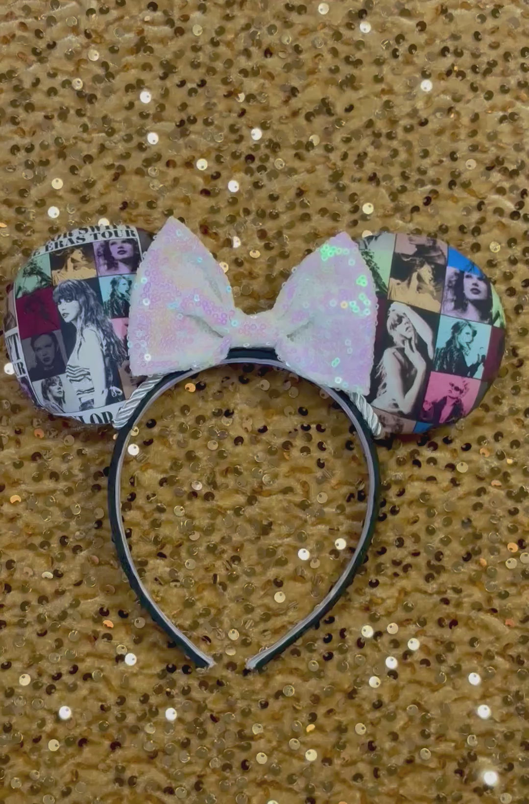Eras Mashup Mouse Ear headband with white iridescent sequin bow. You can request any color sequin bow in your order by leaving a note. Handmade and ready to ship with fabric on both the front and the back of mouse ears. The set has a silver twisted trim along the inner ears. Ears are on a black poly cotton universal sized headband.