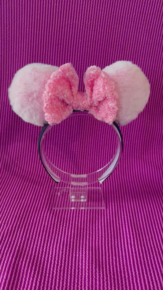 Handmade and ready to ship Pink floral headband with fluffy mouse ears and a big rose bow in the middle. Ears are on a black poly cotton universal sized headband.