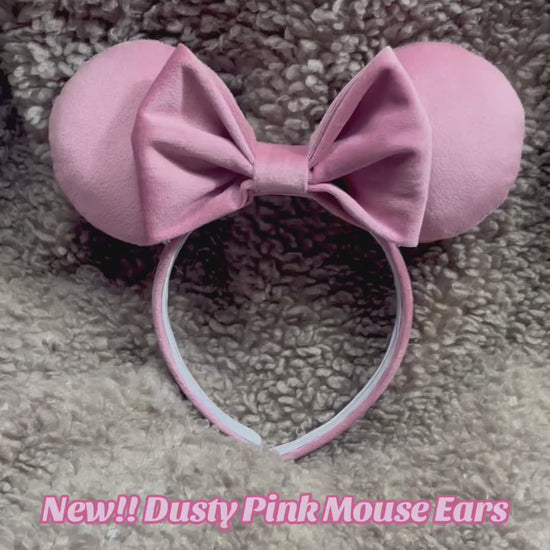 Handmade and ready to ship. Soft Velvety dusty pink Mouse ears with a soft matching bow with pink twisted trim on a universal sized matching headband. 