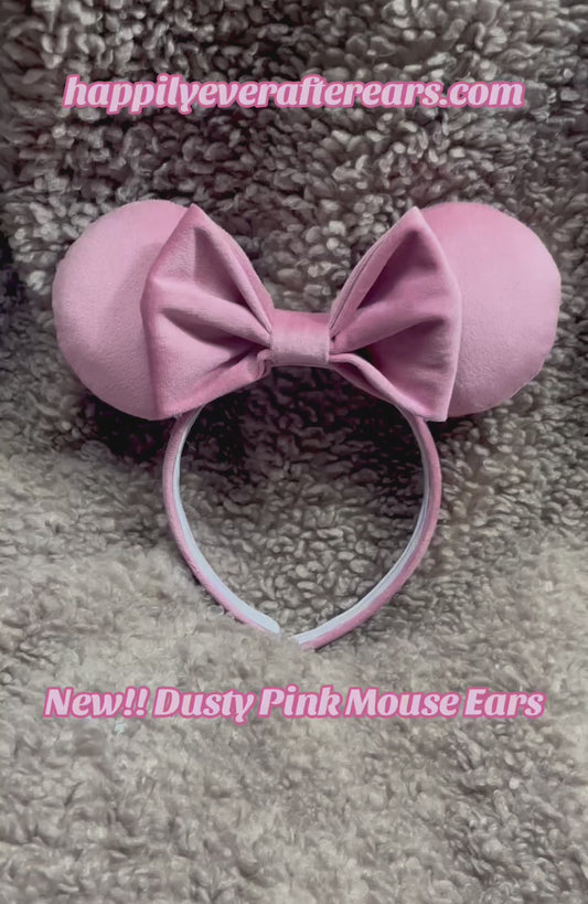 Handmade and ready to ship. Soft Velvety dusty pink Mouse ears with a soft matching bow with pink twisted trim on a universal sized matching headband. 