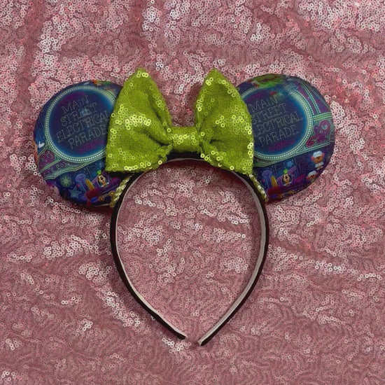 Handmade and ready to ship mouse ears. Mouse ears are on a universal sized poly cotton headband and set comes with a lime green sequin bow. Other colors are available if you leave a note.