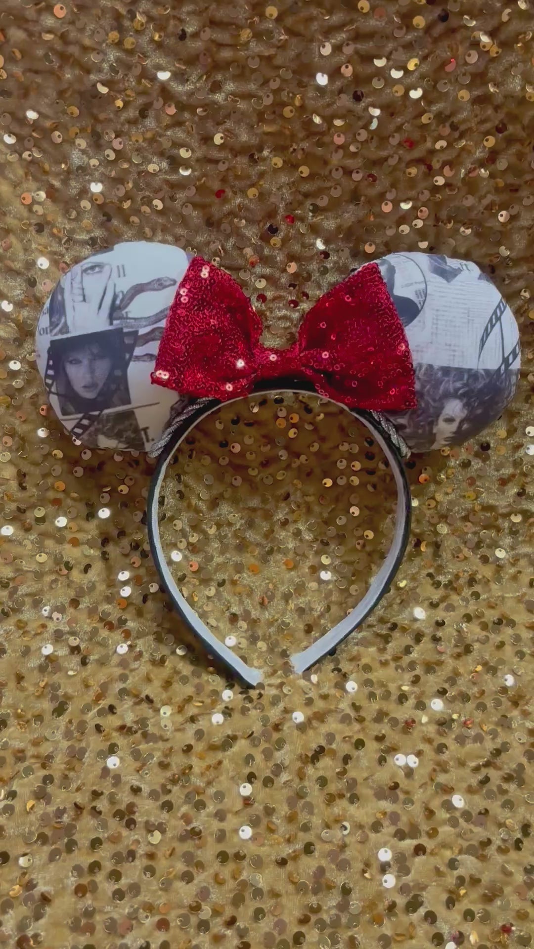 Mouse ears with a red bow on a white background