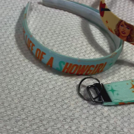 Set of three handmade and ready to ship colorful headbands and two keychains on a white background