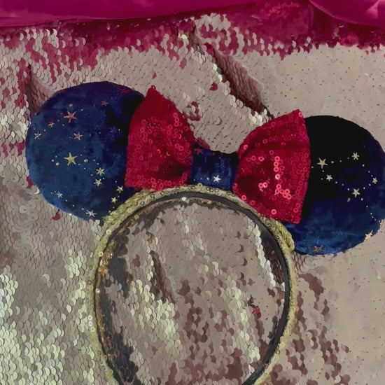 Handmade and ready to ship Navy Velvet fabric with gold stars and red sequin bow mouse ear headband on a gold sequin universal sized headband. 