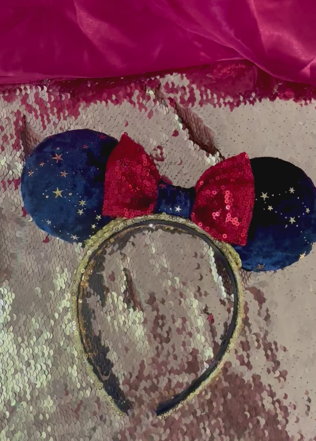Handmade and ready to ship Navy Velvet fabric with gold stars and red sequin bow mouse ear headband on a gold sequin universal sized headband. 