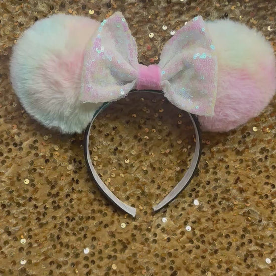 Handmade and ready to ship Fluffy Pastel-colored mouse ears with a white iridescent sequin bow 