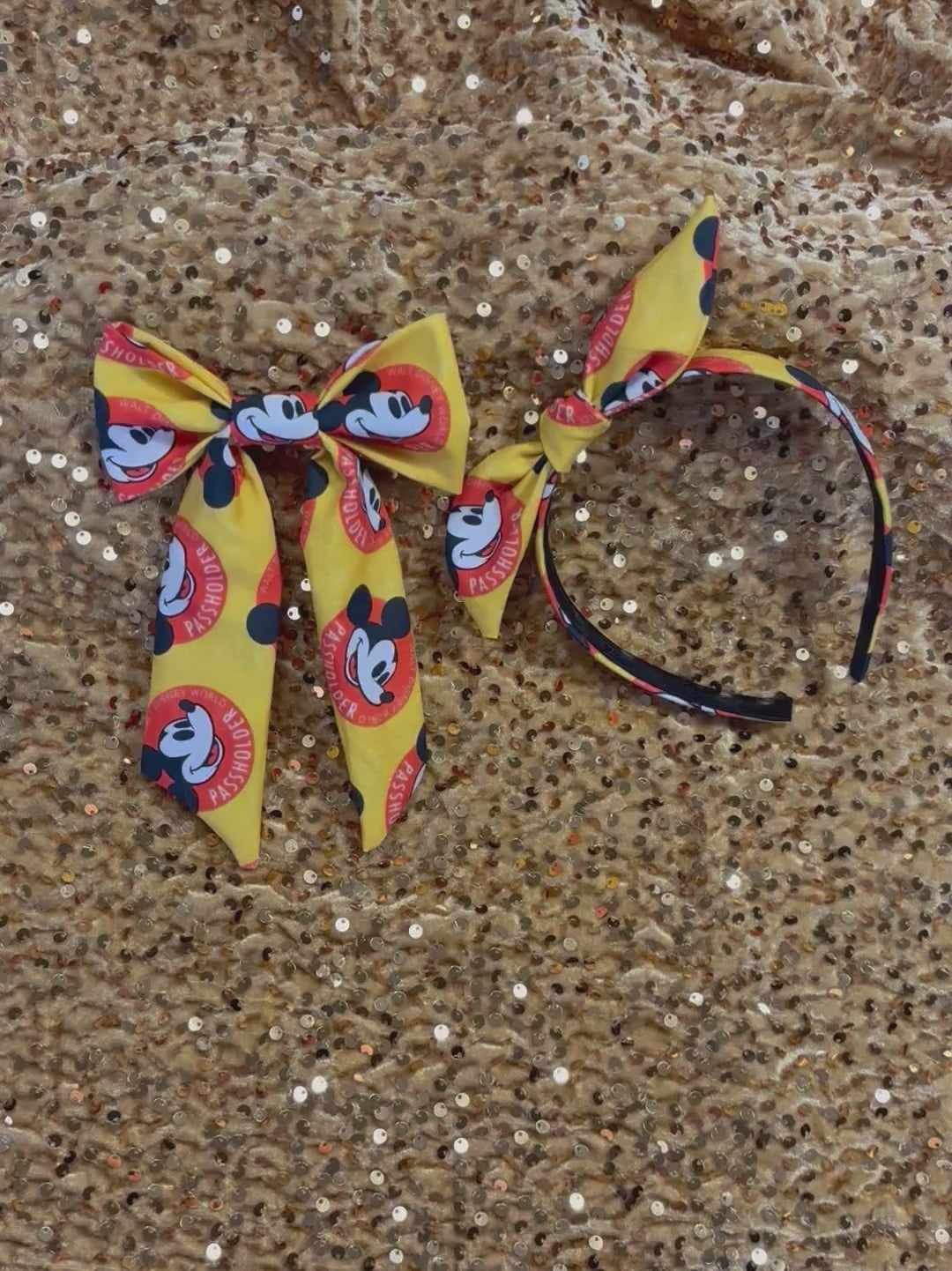 Handmade and ready to ship hair bow and twisted bow headband with cartoon character design with AP logo.